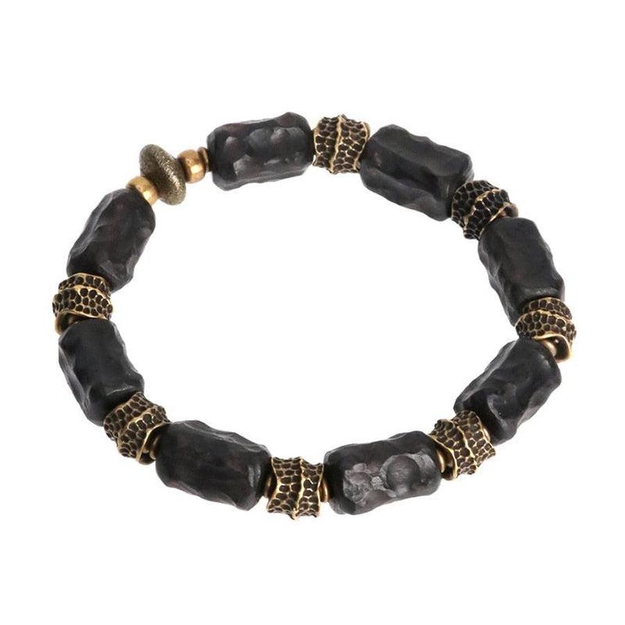 Bracelet en ébène et cuivre sur fond blanc