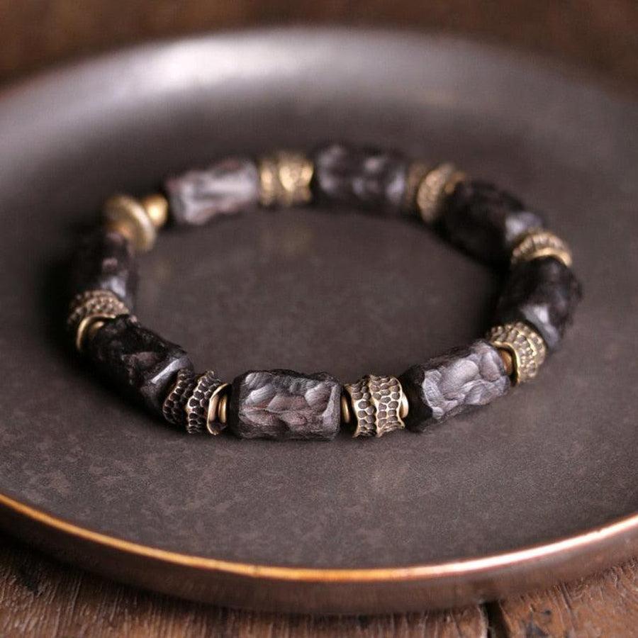 Perles concaves et convexes en bois d'ébène et cuivre