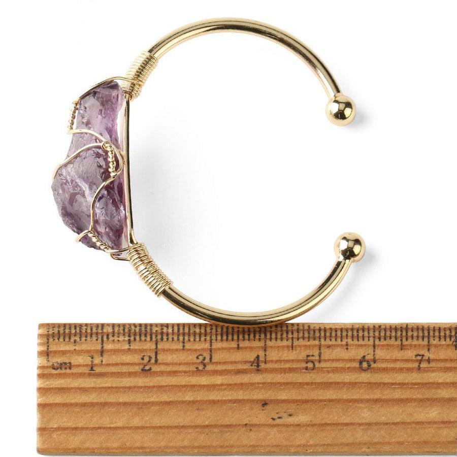 Bracelet ajustable en métal doré avec quartz rose