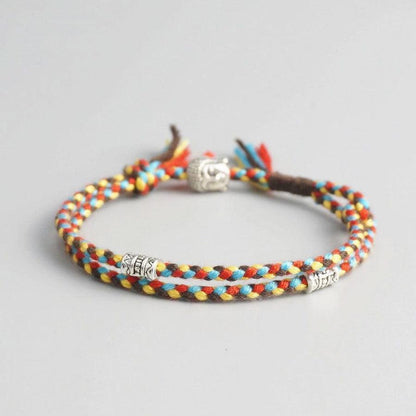 Bracelet vert et jaune avec nœud de la chance ajustable