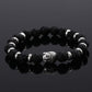 Détail du bracelet zen avec perles argentées et Bouddha