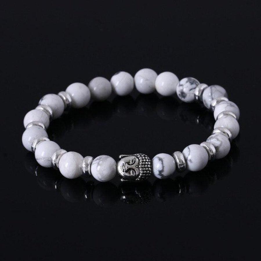 Bracelet zen avec pierres noires et Bouddha argenté