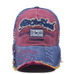 Détail des broderies sur une casquette au design rétro