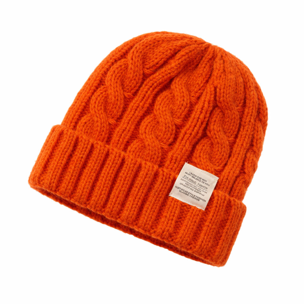 Bonnet d'hiver en maille torsadée, fond neutre
