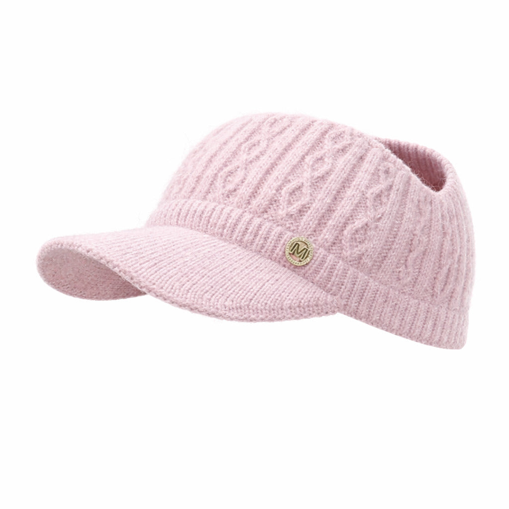 Détail de la maille torsadée du bonnet beige