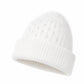 Vue de profil du bonnet, soulignant le design torsadé