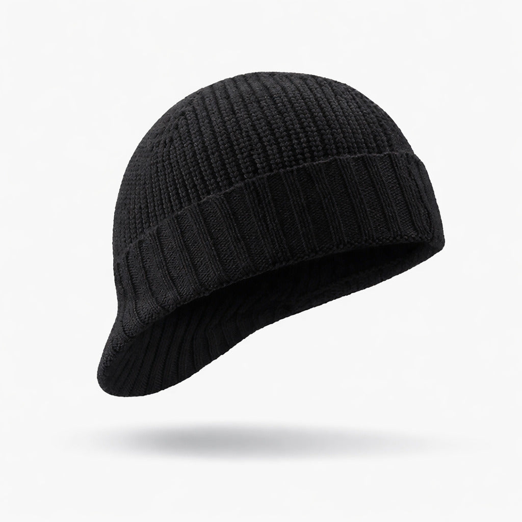 Vue de dessus du bonnet en laine, montrant les détails de la maille