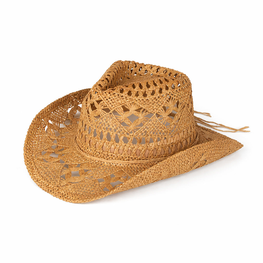 Chapeau cowboy sur un fond désertique