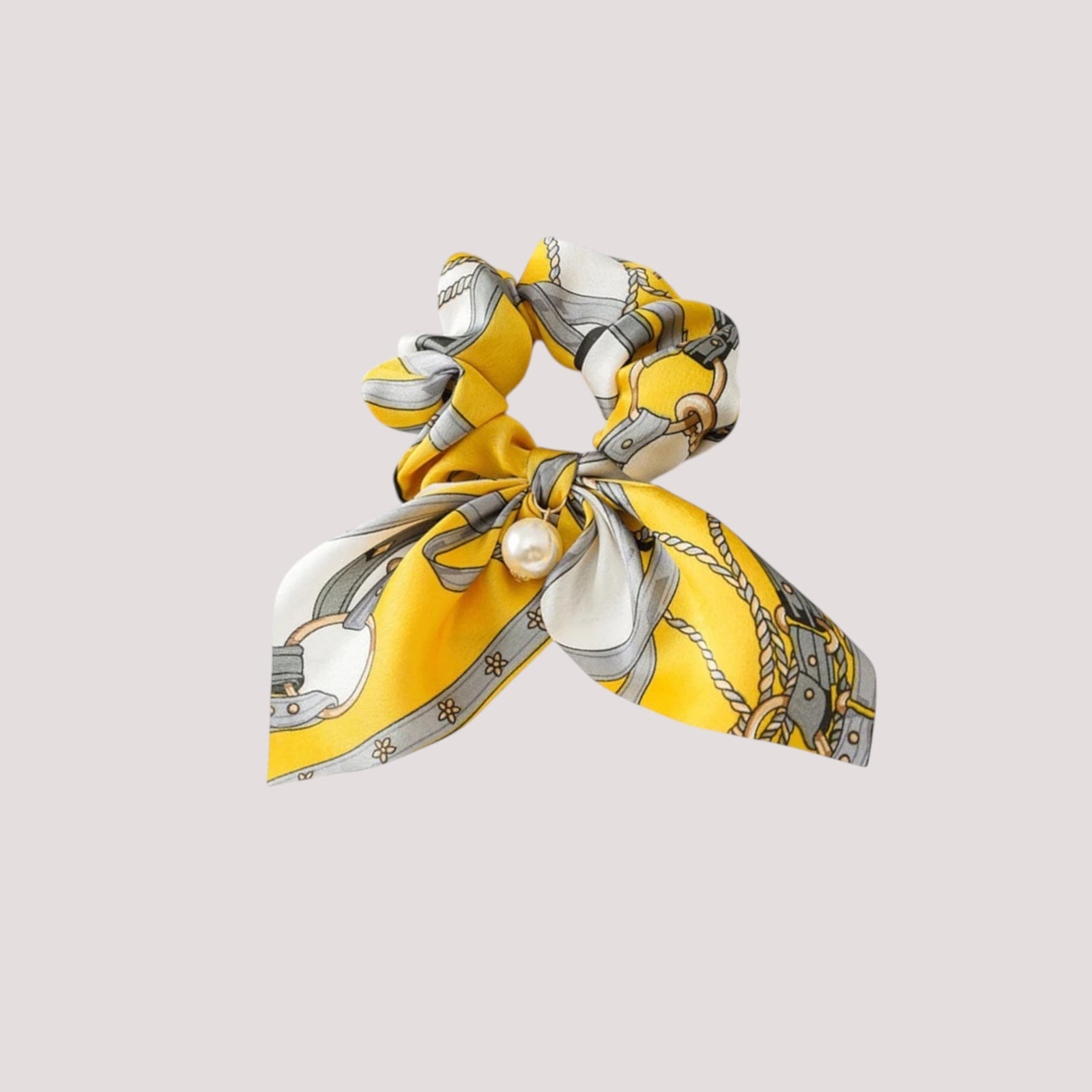 Chouchou foulard jaune avec motifs ceintures, tissu léger