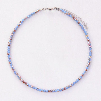 Collier en cristal jaune avec chaînette ajustable visible