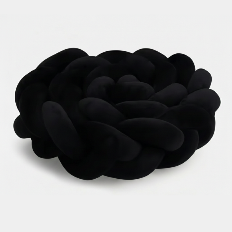 Vue rapprochée d'une tresse de lit noire, texture velours