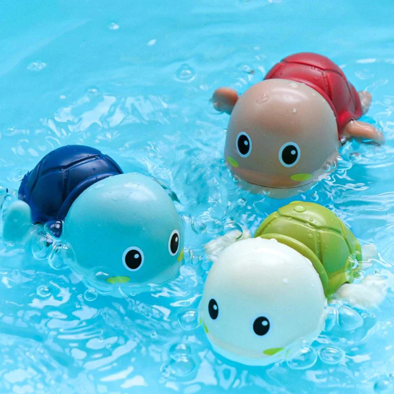 Tortue de bain verte avec mécanisme de remontage visible