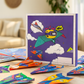 Collection de feuilles colorées pour avions en papier, divers motifs visibles