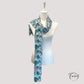 Détail du motif géométrique tribal sur foulard