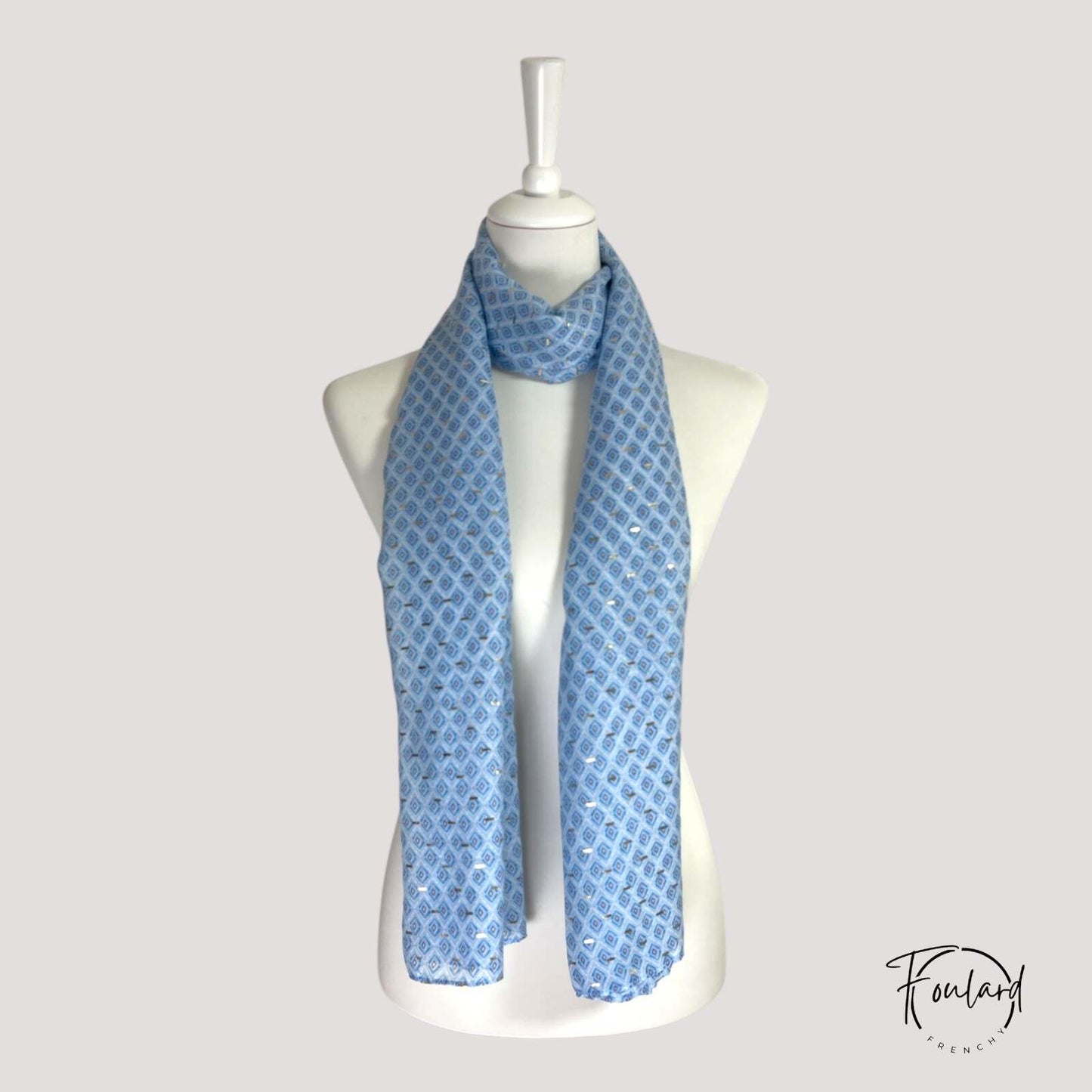 Foulard bleu avec motifs géométriques dorés scintillants