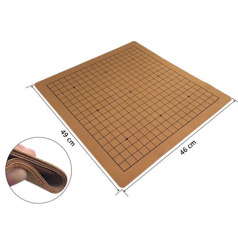 Goban en daim 19x19 déplié sur une table