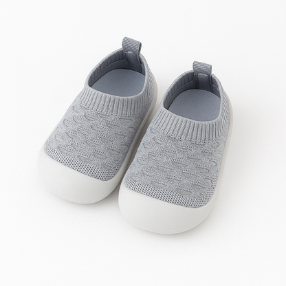 Chaussons souples gris pour enfants, confort et flexibilité