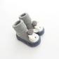 Chaussures bébé grises avec protection anti-collision