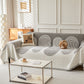 Jeté de canapé gris en coton naturel sur un fauteuil