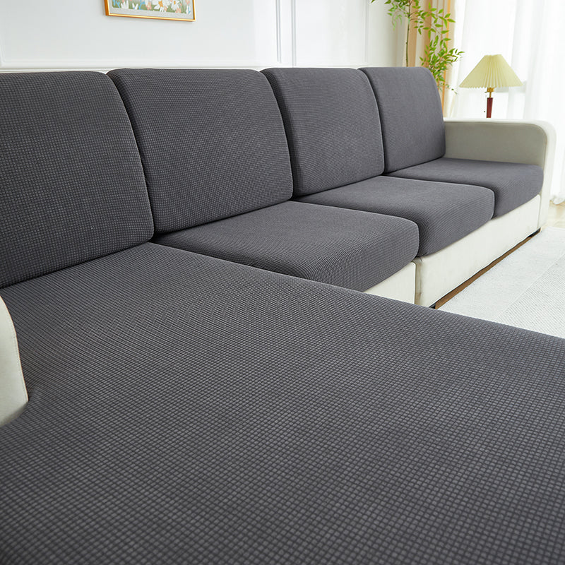 Gros plan sur le tissu jacquard gris, effet anti-taches