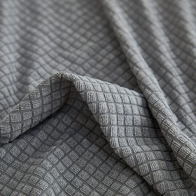 Zoom sur la fermeture de la housse en jacquard gris