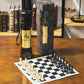 Pièces d'échecs alignées montrant leurs proportions