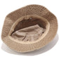 Gros plan sur un bob en coton beige avec protection UV