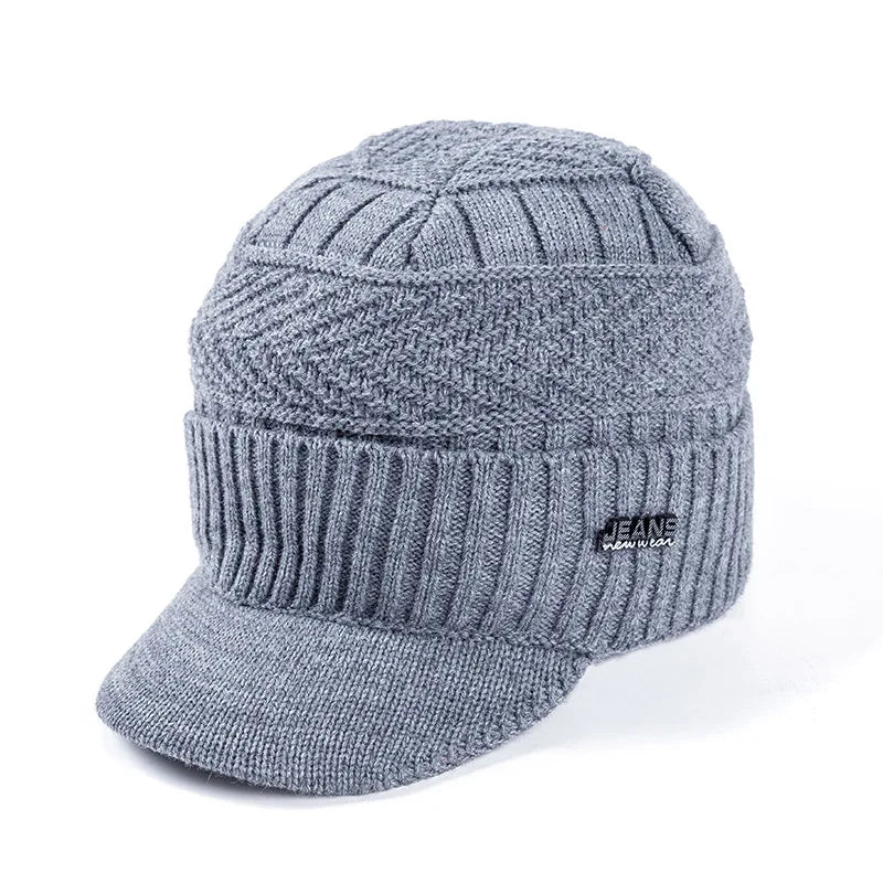 Vue latérale du bonnet montrant la visière protectrice