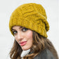 Détail des mailles torsadées du bonnet