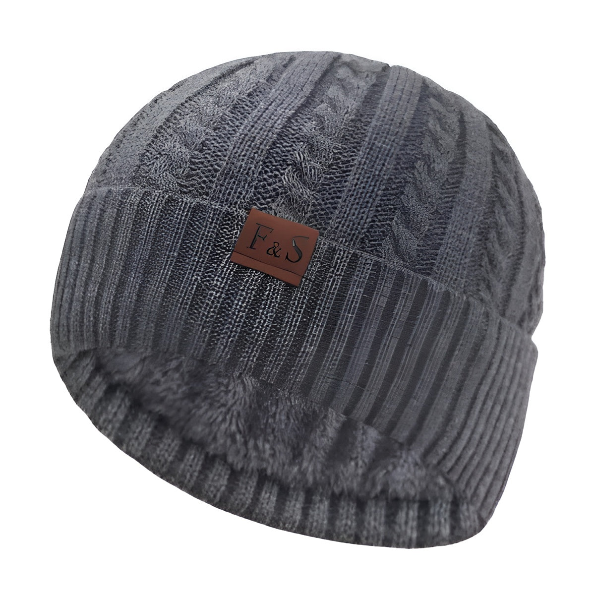 Gros plan sur la maille torsadée du bonnet