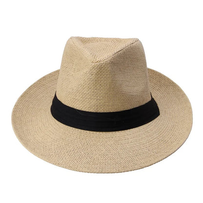 Chapeau de paille sur une table en terrasse, ambiance estivale