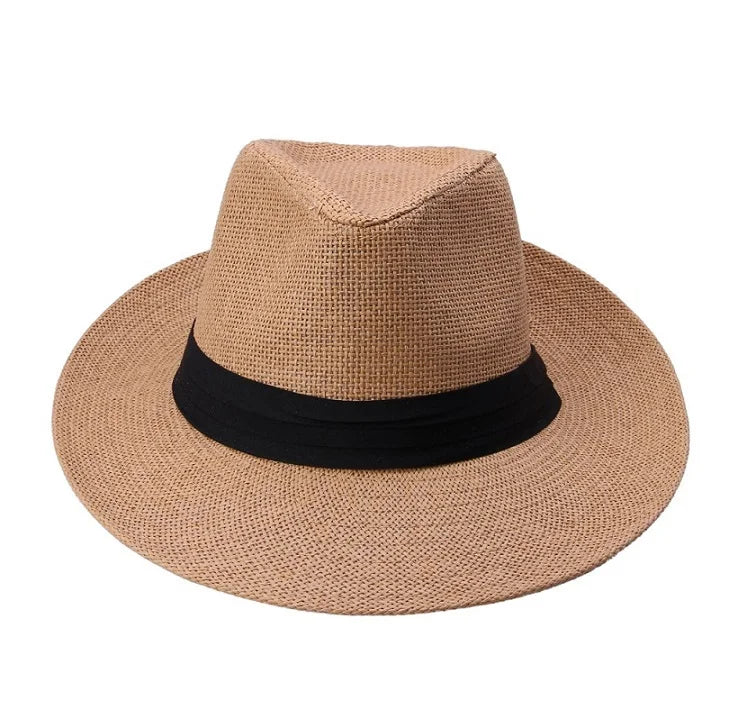 Chapeau de paille avec bord large, posé sur un rocher