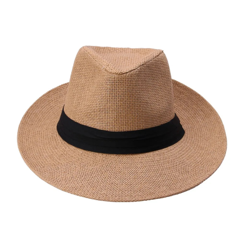 Vue aérienne d'un chapeau de paille sur une plage de sable