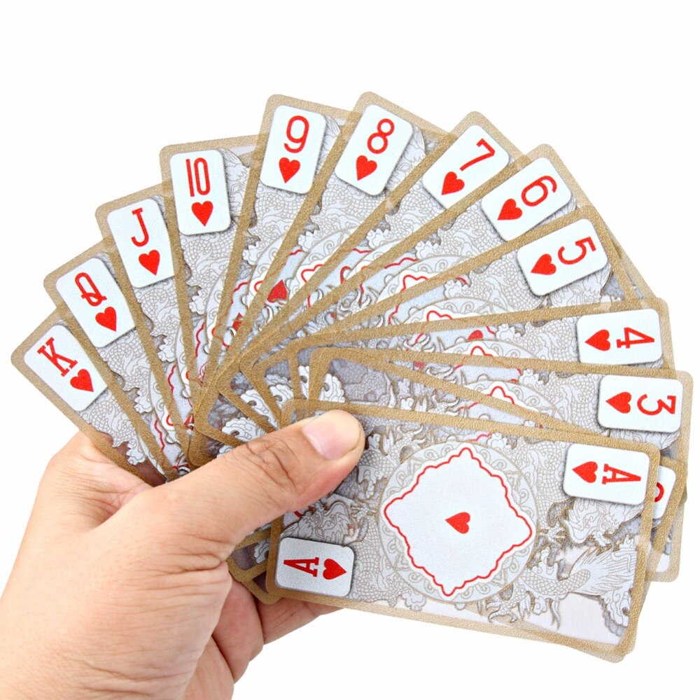 Cartes de jeu dispersées, motifs marbre et doré