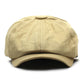 Gros plan sur une casquette gavroche ajustable en coton