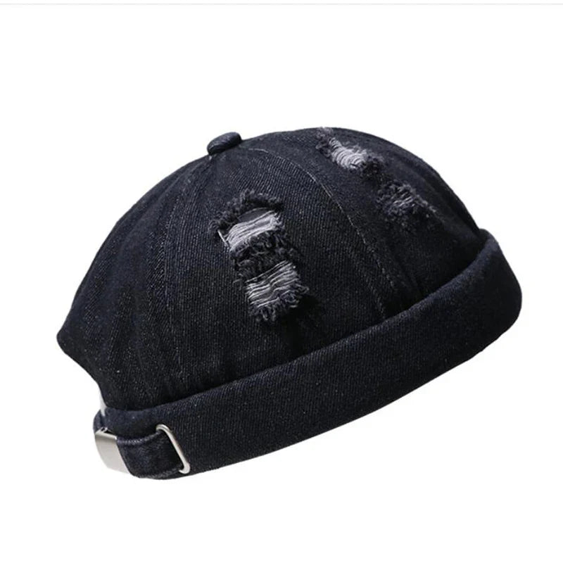 Détail des déchirures artistiques sur le bonnet