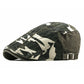 Détail du bord d'un béret camouflage, couture apparente