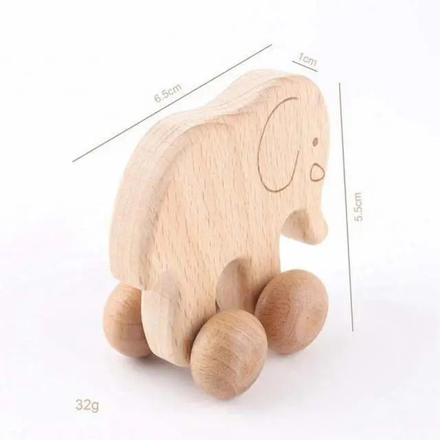 Hochet en bois en forme d'éléphant avec roues visibles