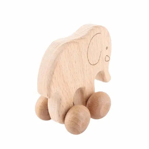 Vue latérale d'un hochet éléphant en bois pour bébé