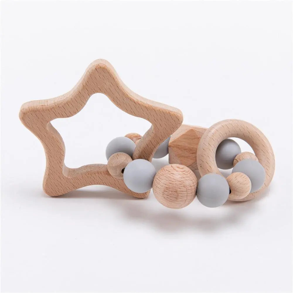 Hochet en bois en forme d'étoile avec perles colorées