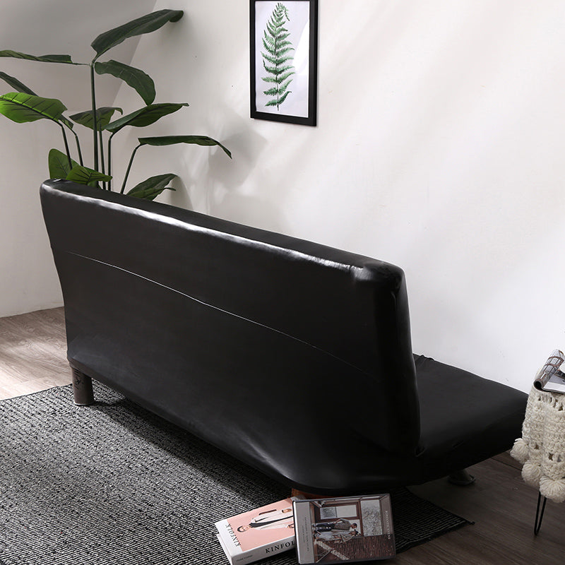 Housse installée sur un canapé-lit, vue latérale