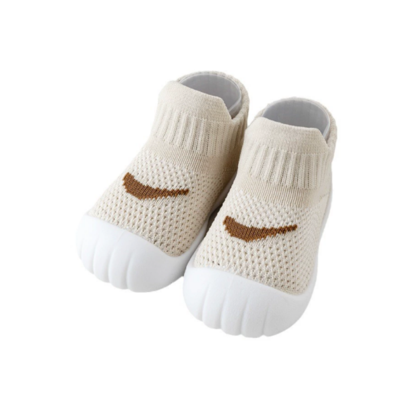 Chaussons bébé couleur ivoire avec semelle souple