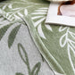 Zoom sur le tissage artisanal du jeté de canapé