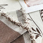 Motifs bohèmes élégants sur un fond marron