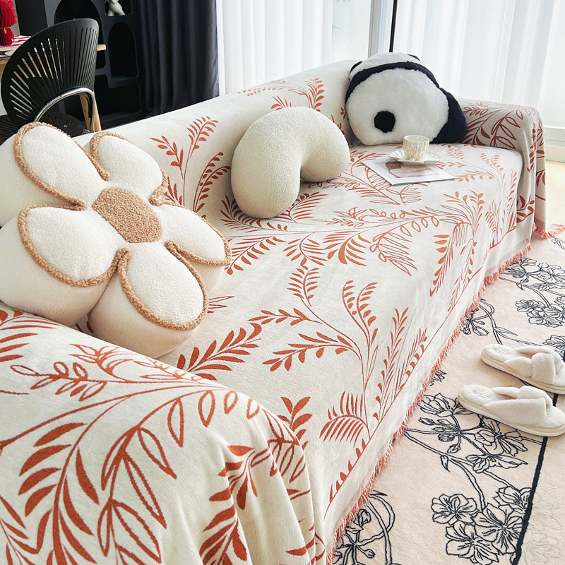 Jeté de canapé en coton avec motifs feuillage orange