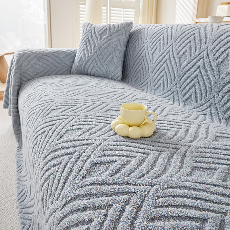 Détail du tissu polaire ultra-doux avec motif feuilles