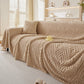 Zoom sur les finitions impeccables du jeté polaire