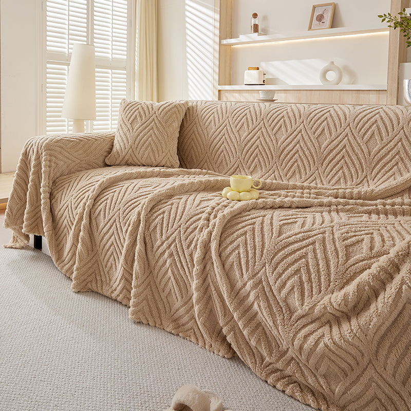 Zoom sur les finitions impeccables du jeté polaire