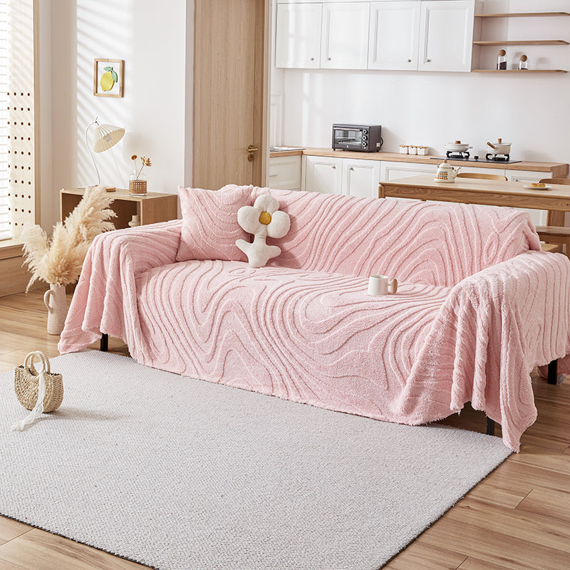 Jeté de canapé rose avec motif ondulé, texture douce