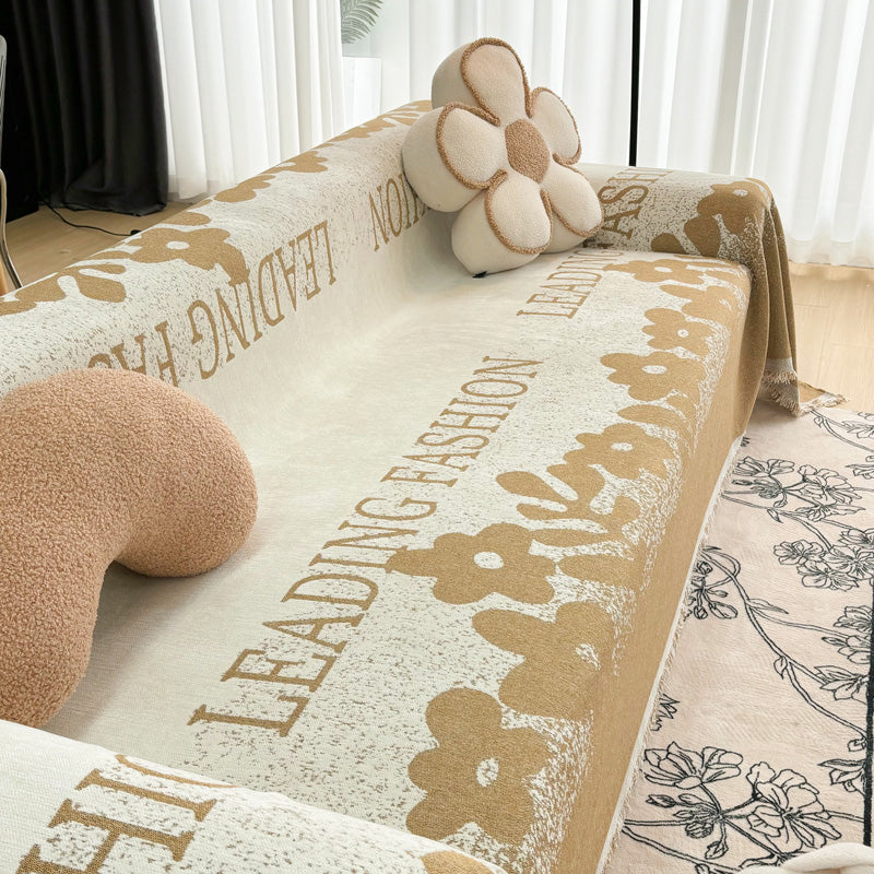 Gros plan sur le tissage artisanal du jeté en coton